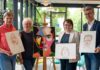 Die Open-Air-Ausstellung „X mal 117 - Gesichter unserer Stadt“ zeigt die Vielfalt durch Portraits von Menschen aus 117 Nationen